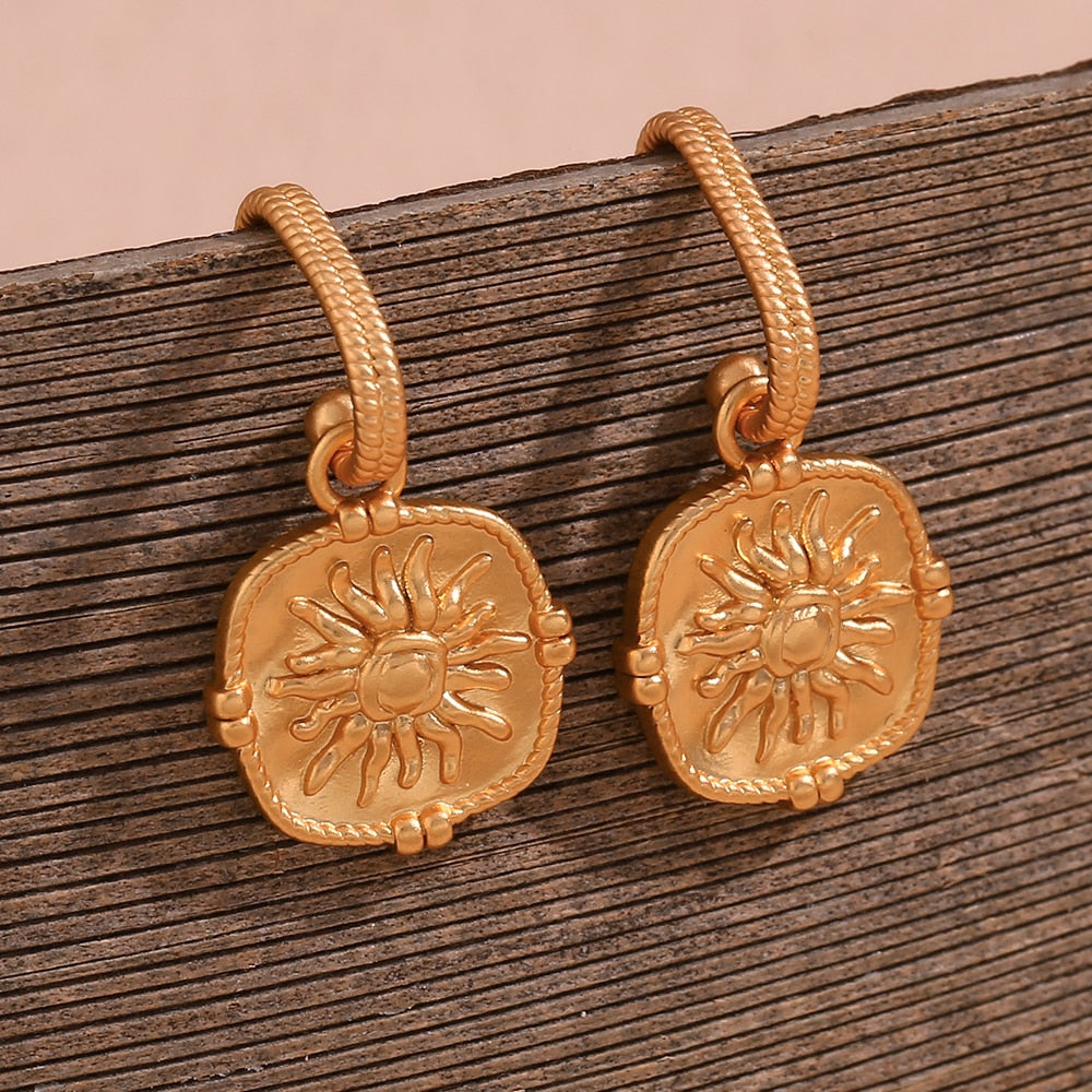 Embossed Fire Sun Drop Hoop Earrings